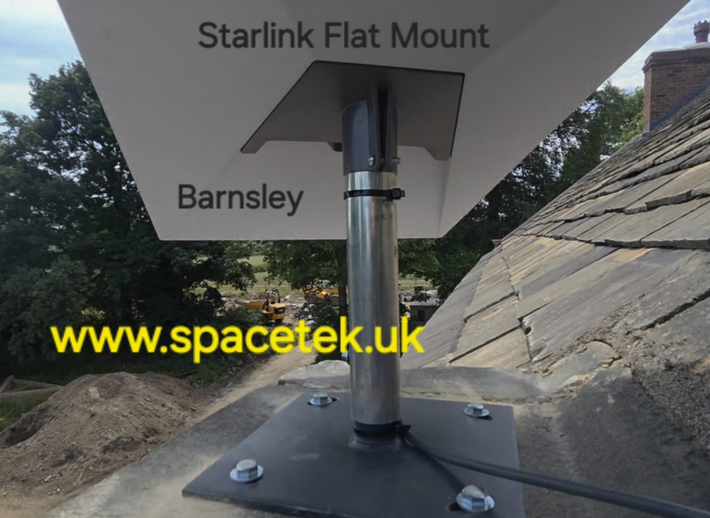 Starlink satellite dish mounted on a pole with a 'Starlink Flat Mount – Barnsley' label; construction site and roof tiles visible in background.